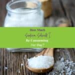 Salt in jar and in a wooden spoon