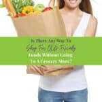 Young woman holding a shopping bag full of groceries