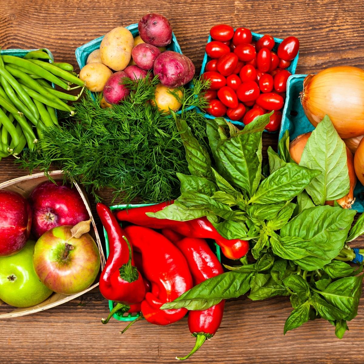 Apples and various types of vegetables