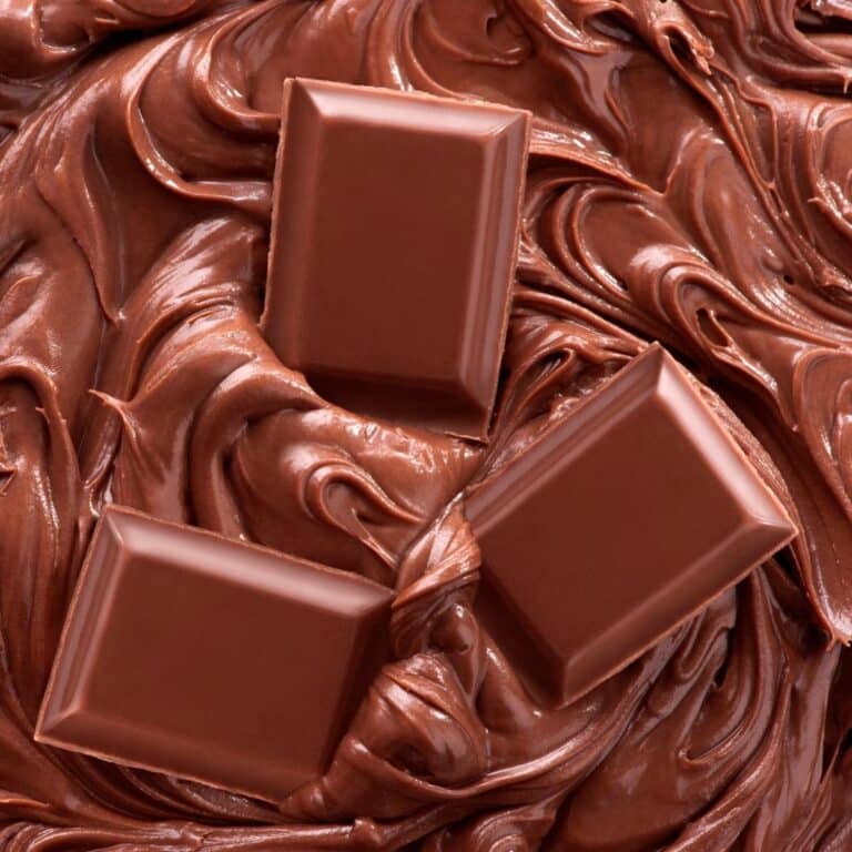 3 pieces chocolate bar with Melted Chocolate Background