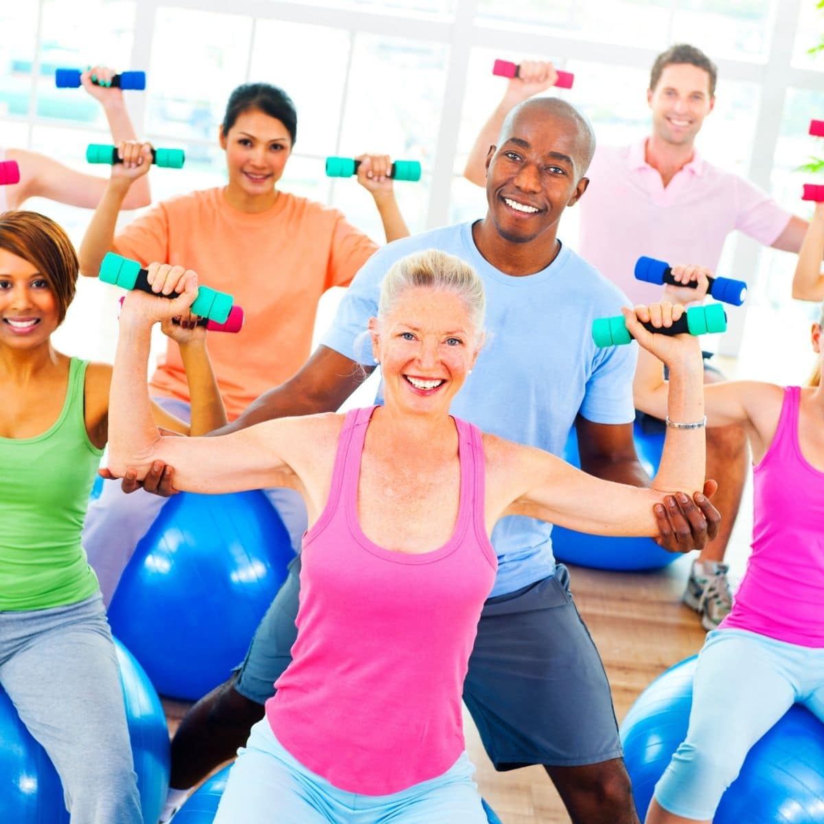 People holding exercise equipment