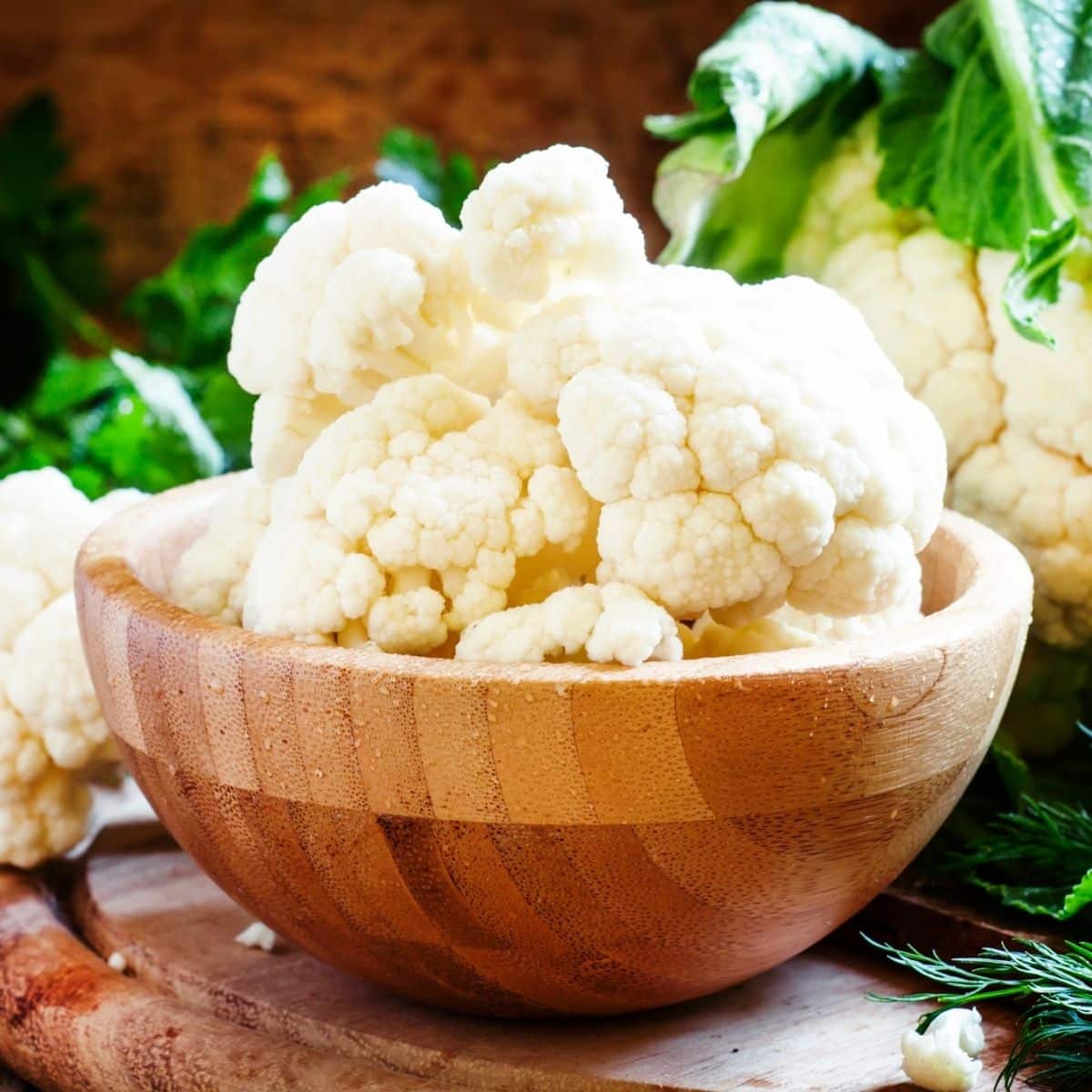 Cauliflower in a wooden bowl.