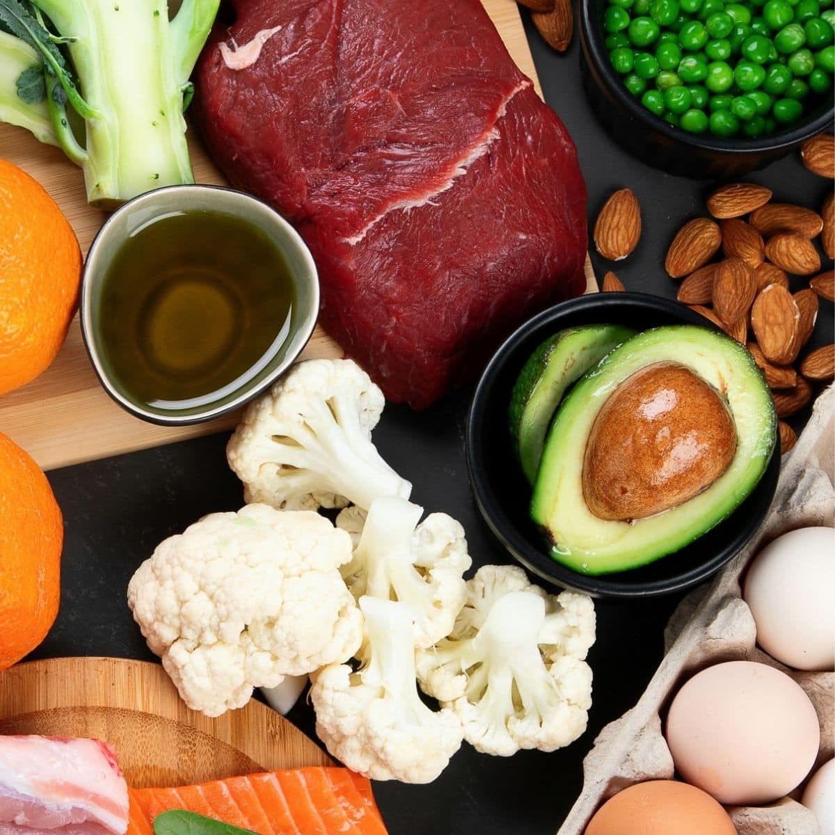 Assortment of foods high in iron. Beef liver, Peas, Broccoli, Eggs