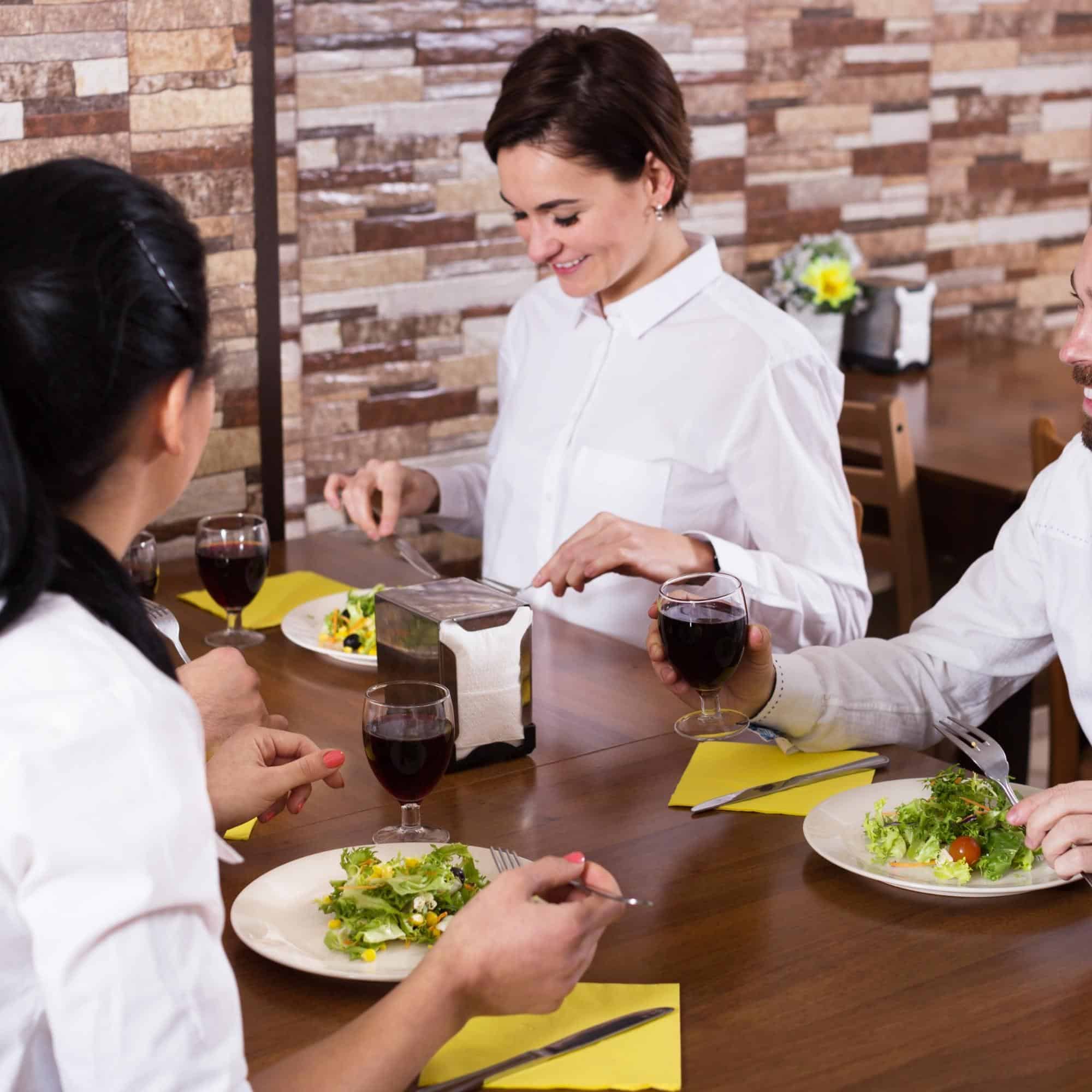 Group of people dining out in restaurant