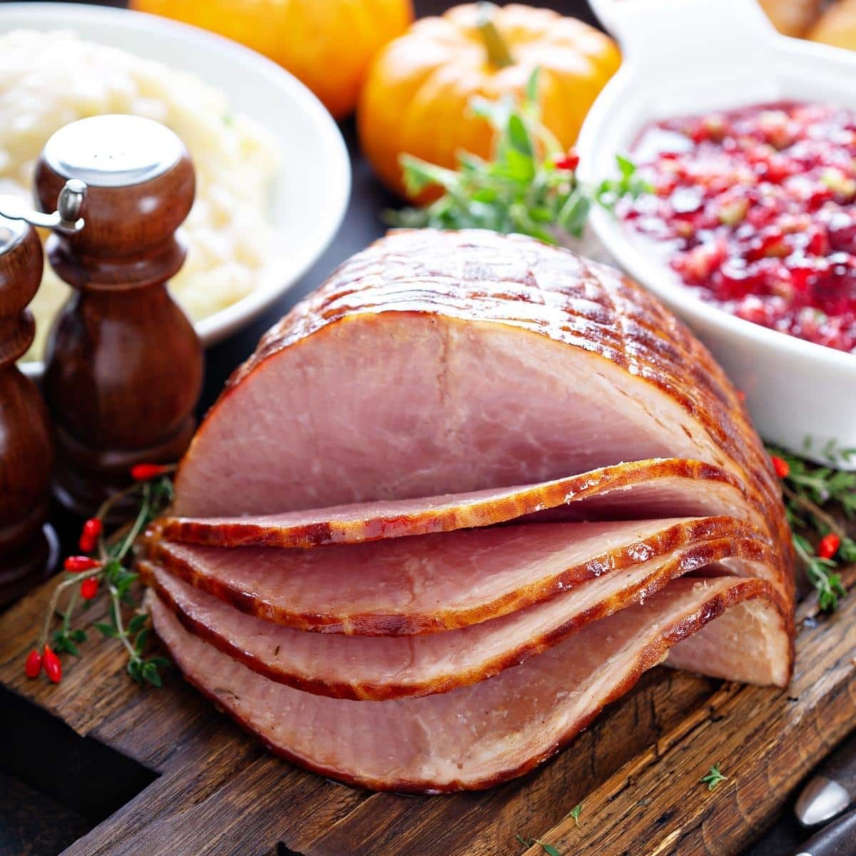 Holiday glazed sliced ham on dinner table