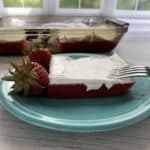 sugar free red gelatin on plate with whipped topping