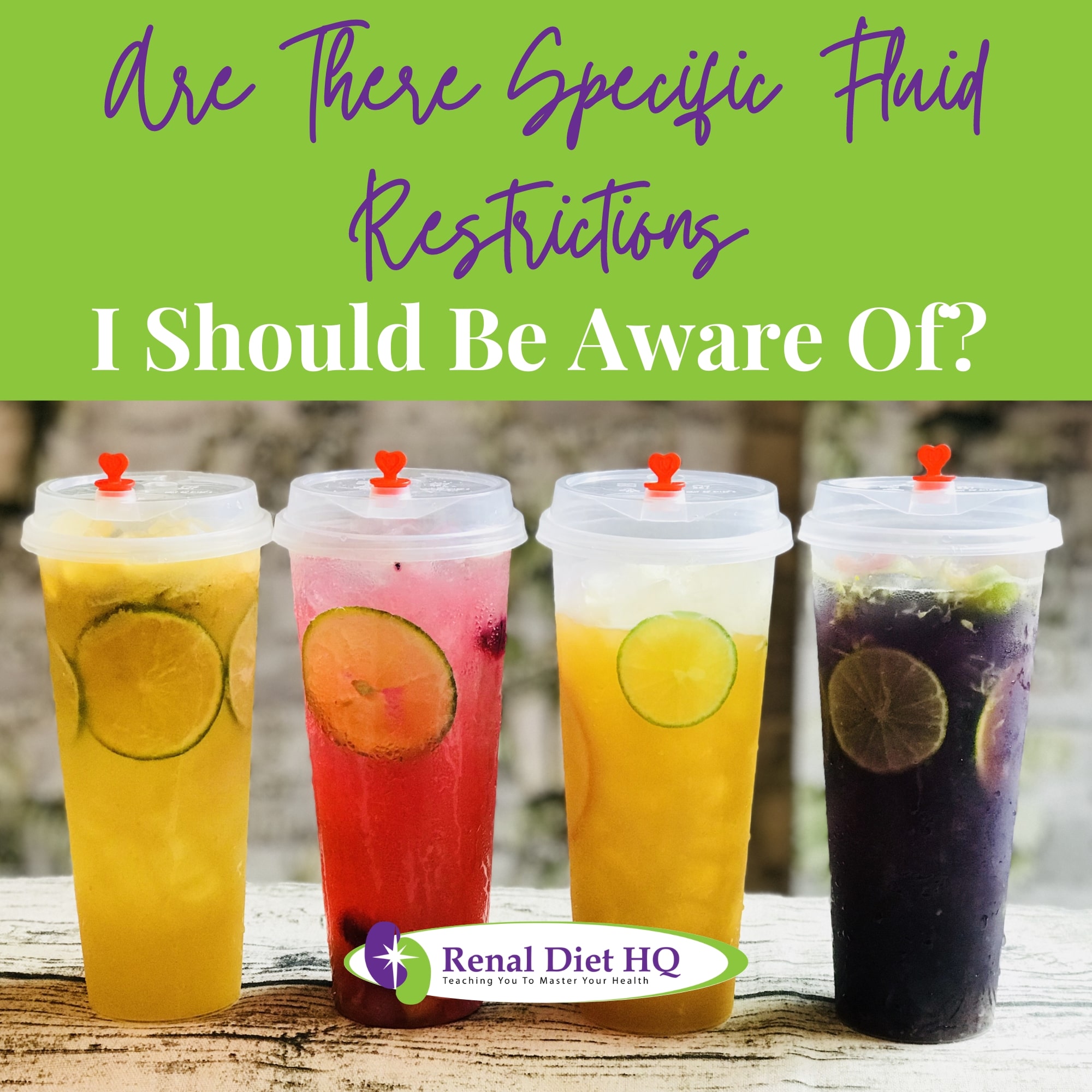 Four different colored drinks in plastic cups on a wooden table