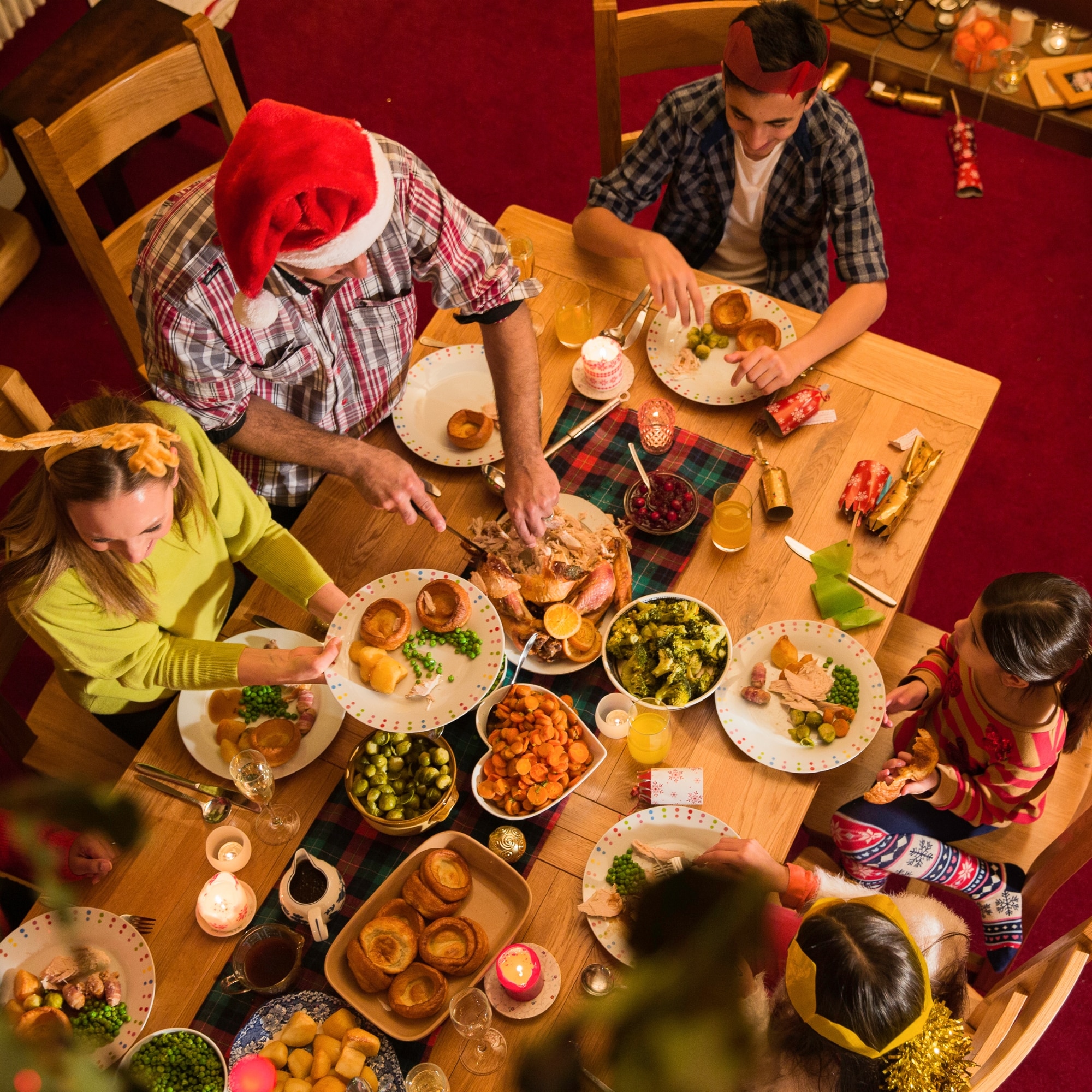 Family eating healthy foods together on christmas holliday.