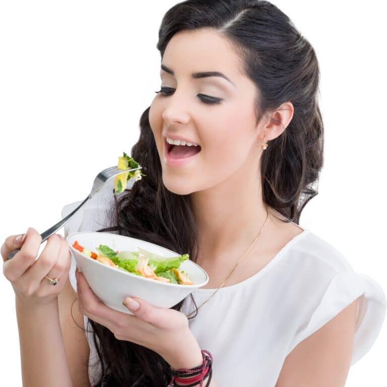 a person eating a salad