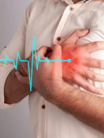 Men Who Are Suffering from Acute Heart Disease Using Their Hands