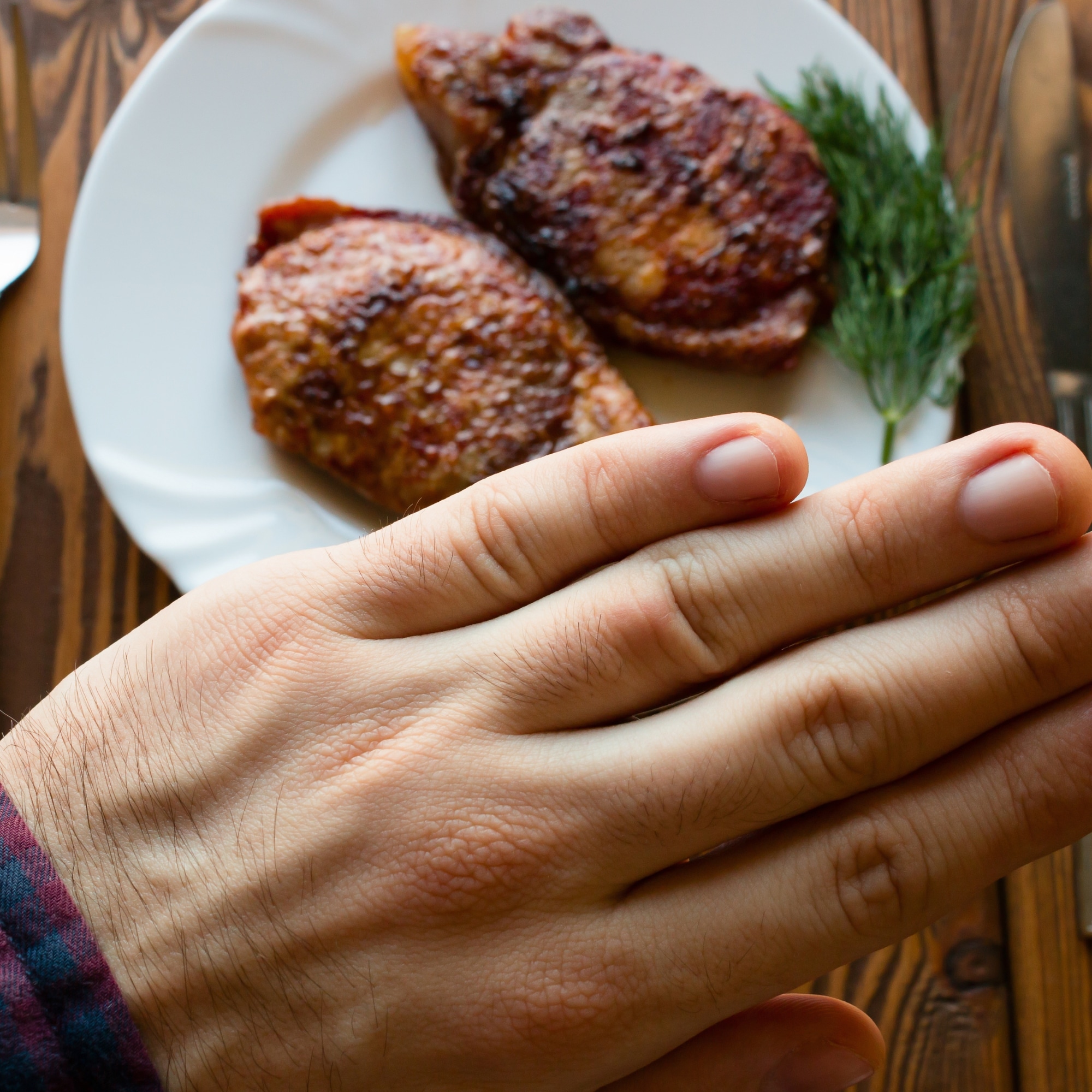 hand refusing meat