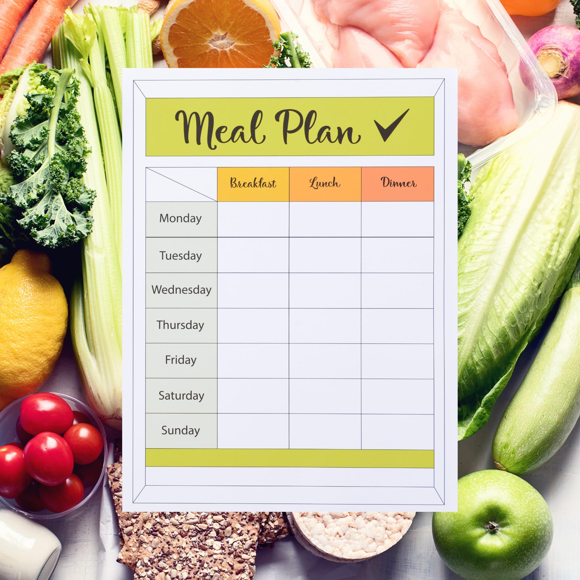 an assortment of fruits, vegetables, and meat and Meal Plan sheet.