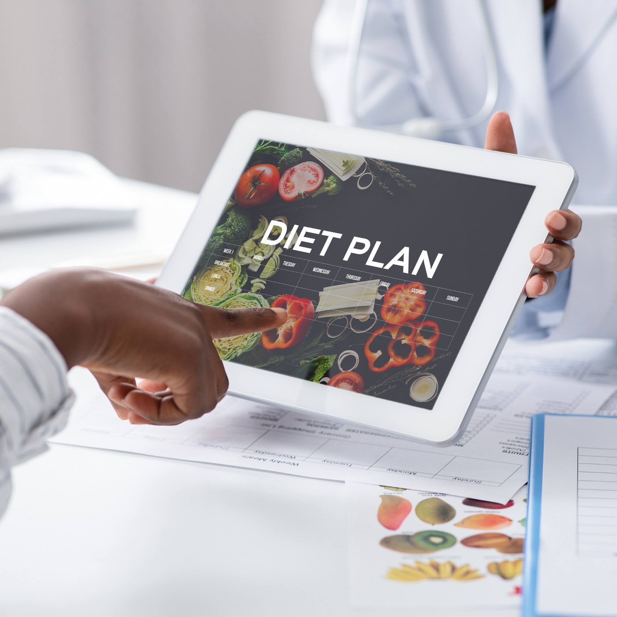 Doctor Holding Digital Tablet With Diet Plan App, Patient Choosing Nutrition