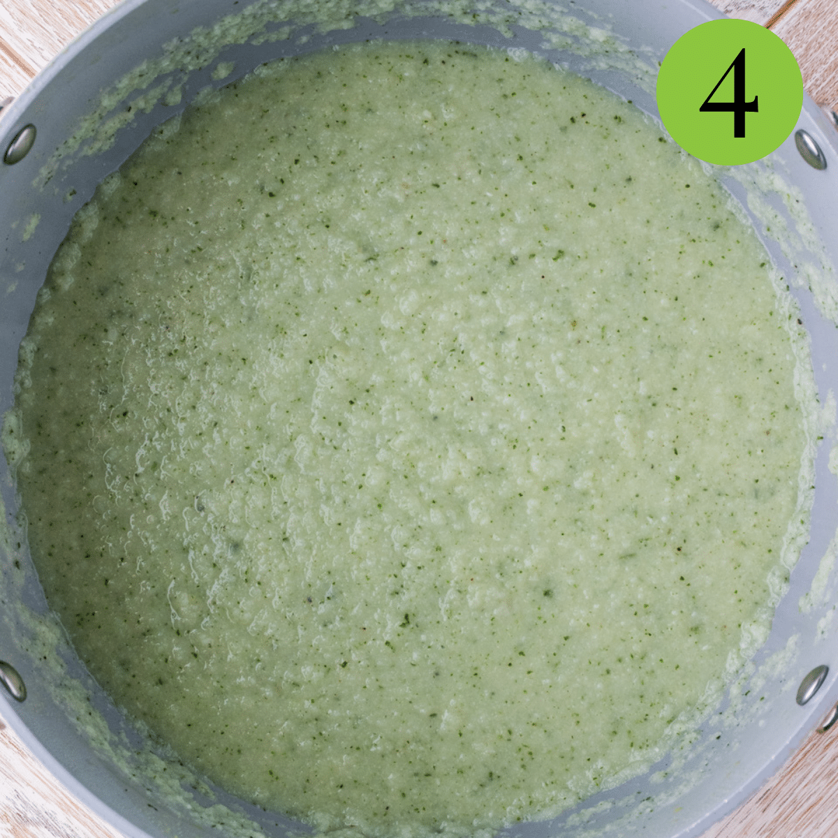 Add cauliflower mixture into the pot to begin cooking it. 
