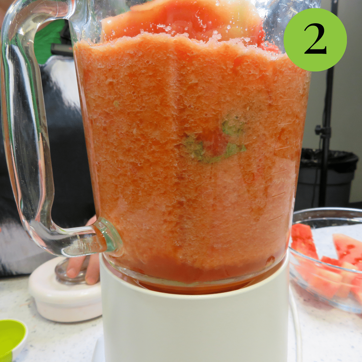 Blended up ingredients for Watermelon Gazpacho in a blender. 
