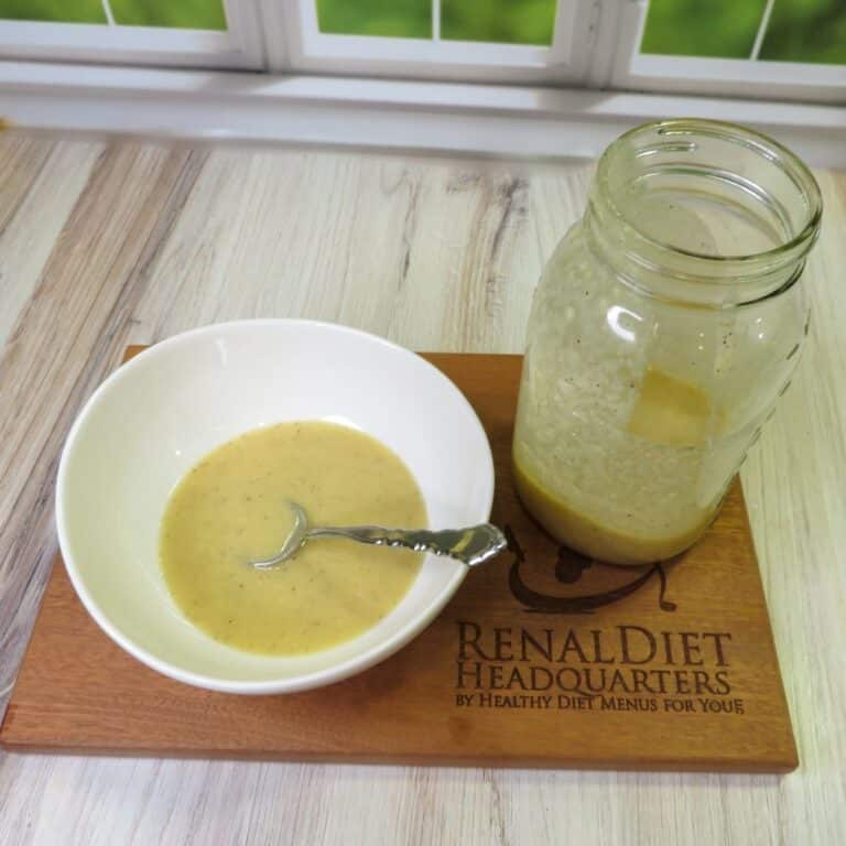 Caesar Dressing No Anchovies in a bowl with a spoon ready to be enjoyed.
