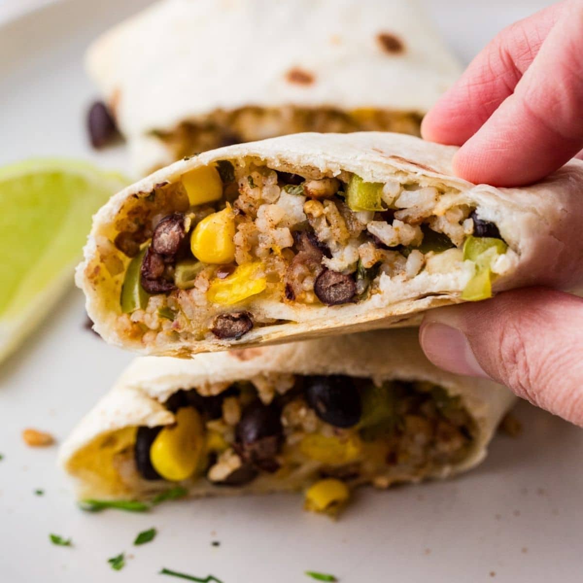 Close Up Of Rice, Corn and Black Bean Burritos