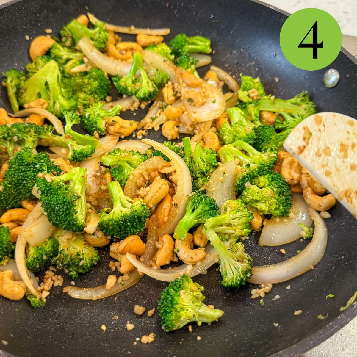 step 4 cashews and onion and broccoli