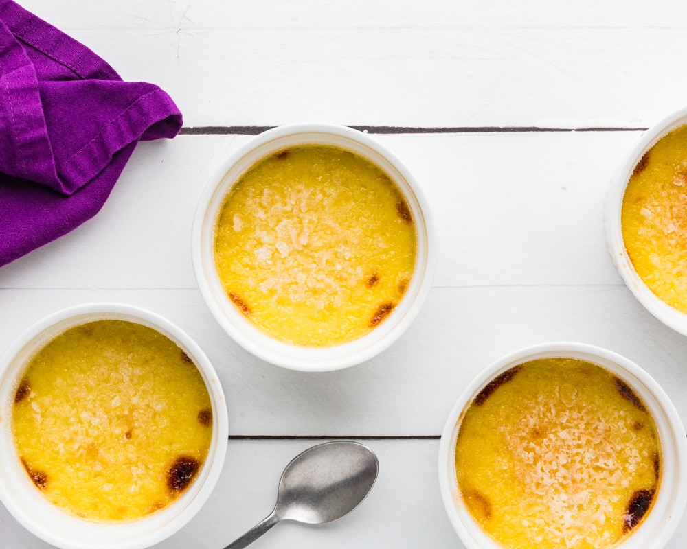 Dairy Free Creme Brulee in container with a spoon