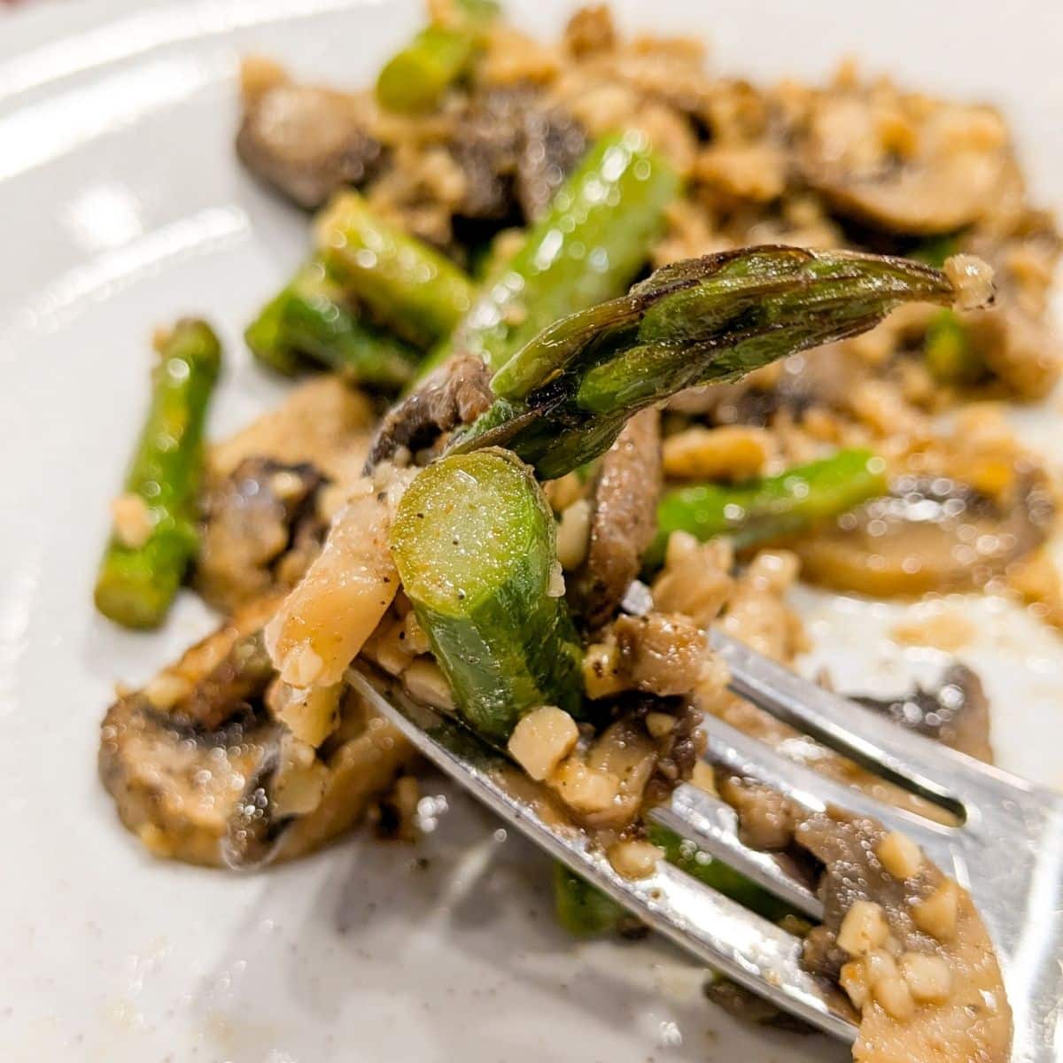 Close Up Of Roasted Asparagus and Mushrooms